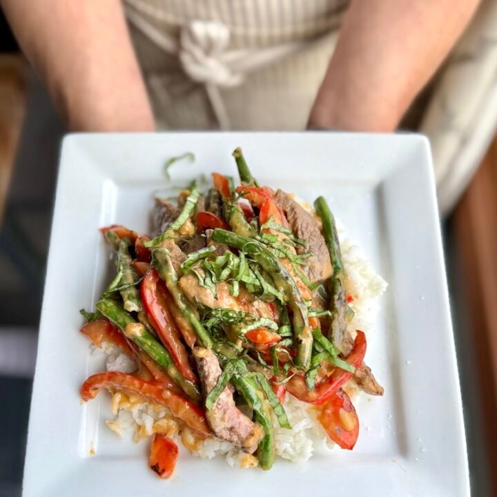 this is a plate of thai red curry beef