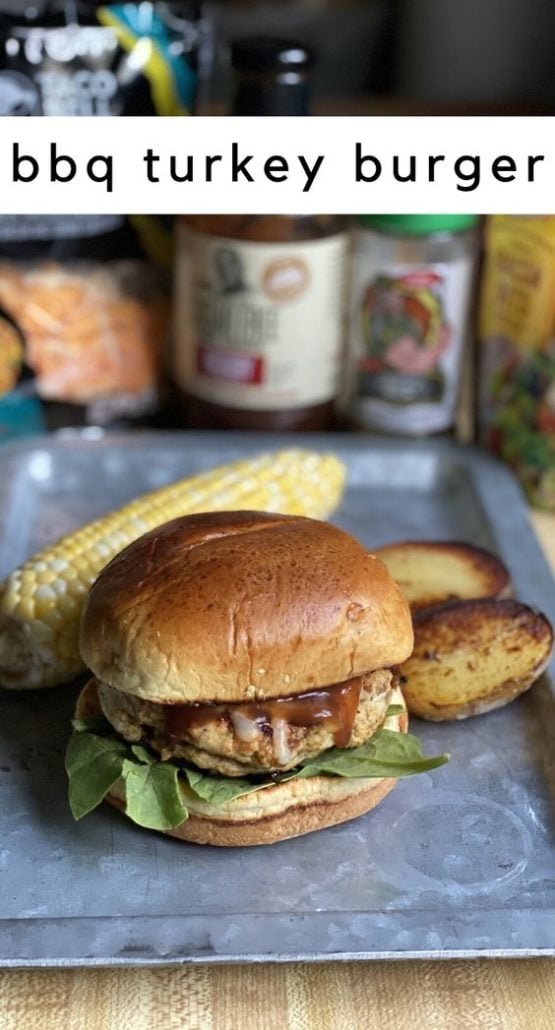 A 9 ingredient juicy burger made with G. Hughes sugar-free BBQ sauce, bacon bits, cheese, and spinach on a brioche bun that can be made in under 20 minutes. #turkeyburger #bbq #barbeque #burgerrecipes #weightwatchers