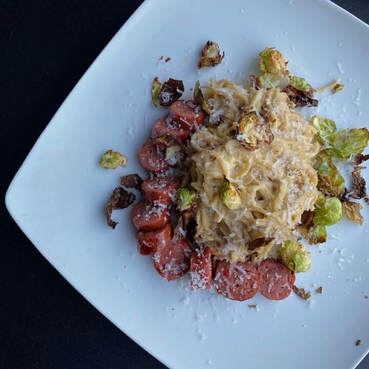 this is a photo of pasta on a plate