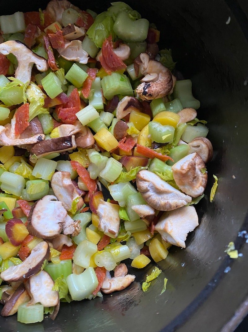 this is a pot of chopped veggies that will turn into pasta sauce