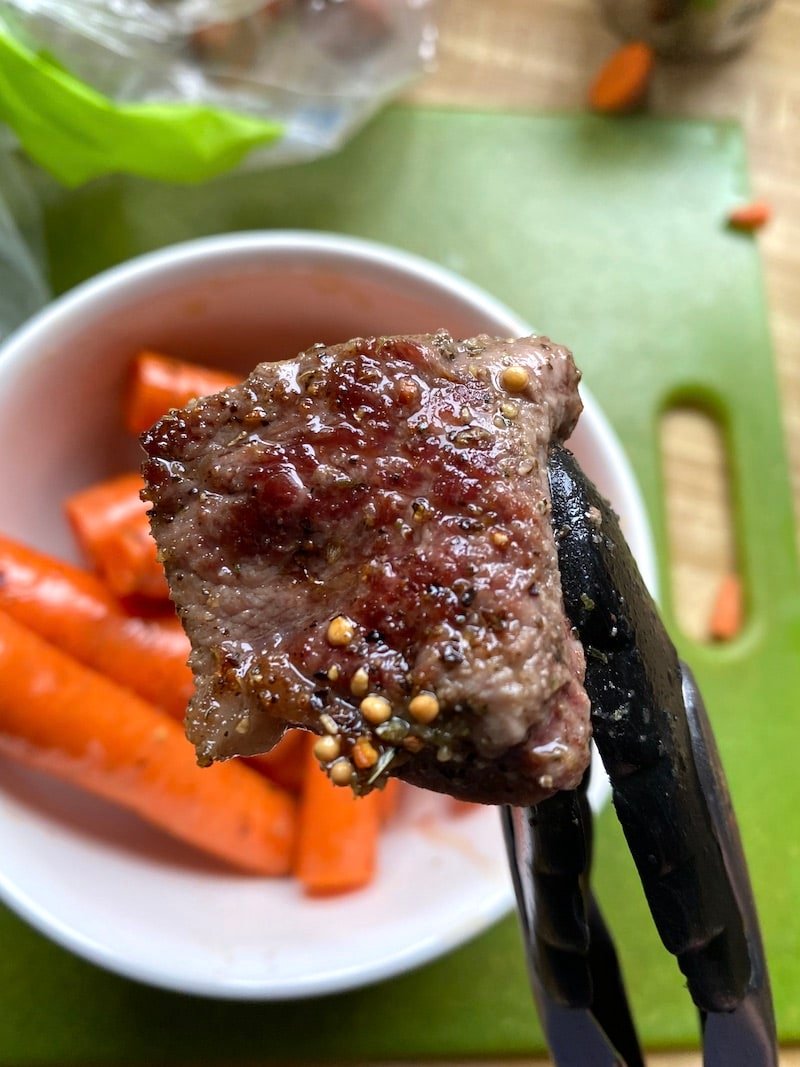 this is a close up picture of seared beef with seasonings