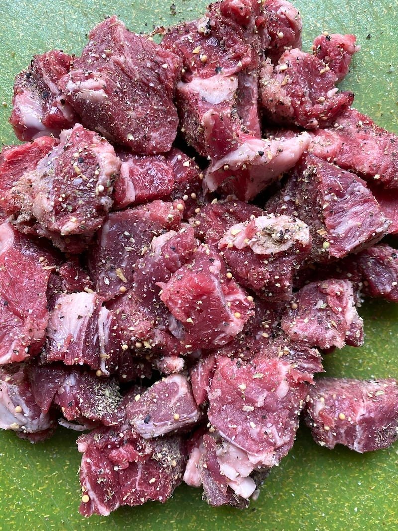 this is a photo of trimmed meat seasoned and ready to sear