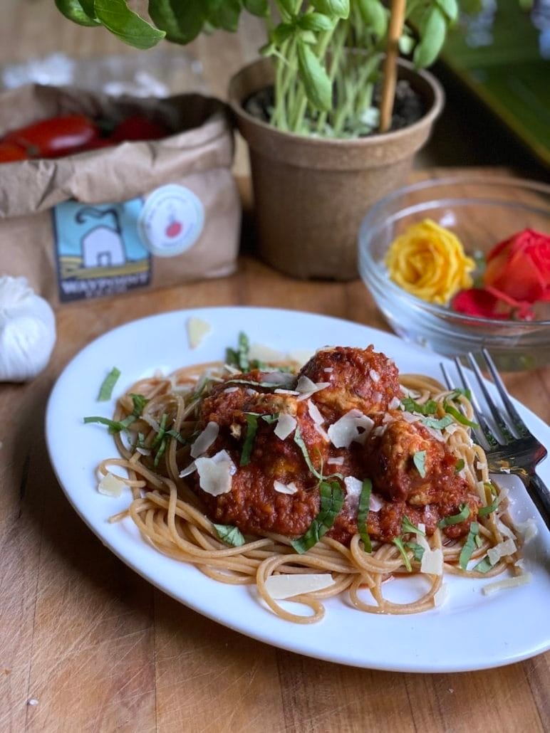 this is a photo of chicken meatballs with marinara