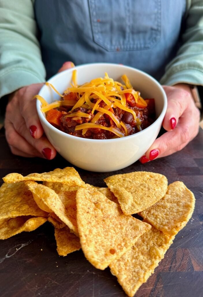 this is a bowl of beef, black bean and sweet potato chili