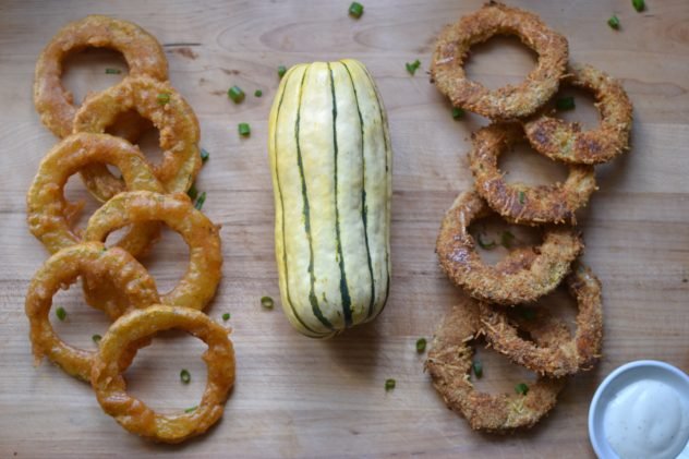 this is a photo of delicata squash prepared two ways - one fried and one baked