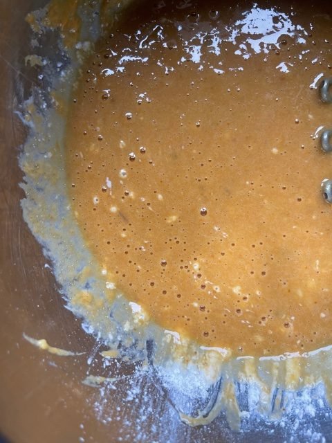 this is a photo of banana pumpkin pancake muffin batter