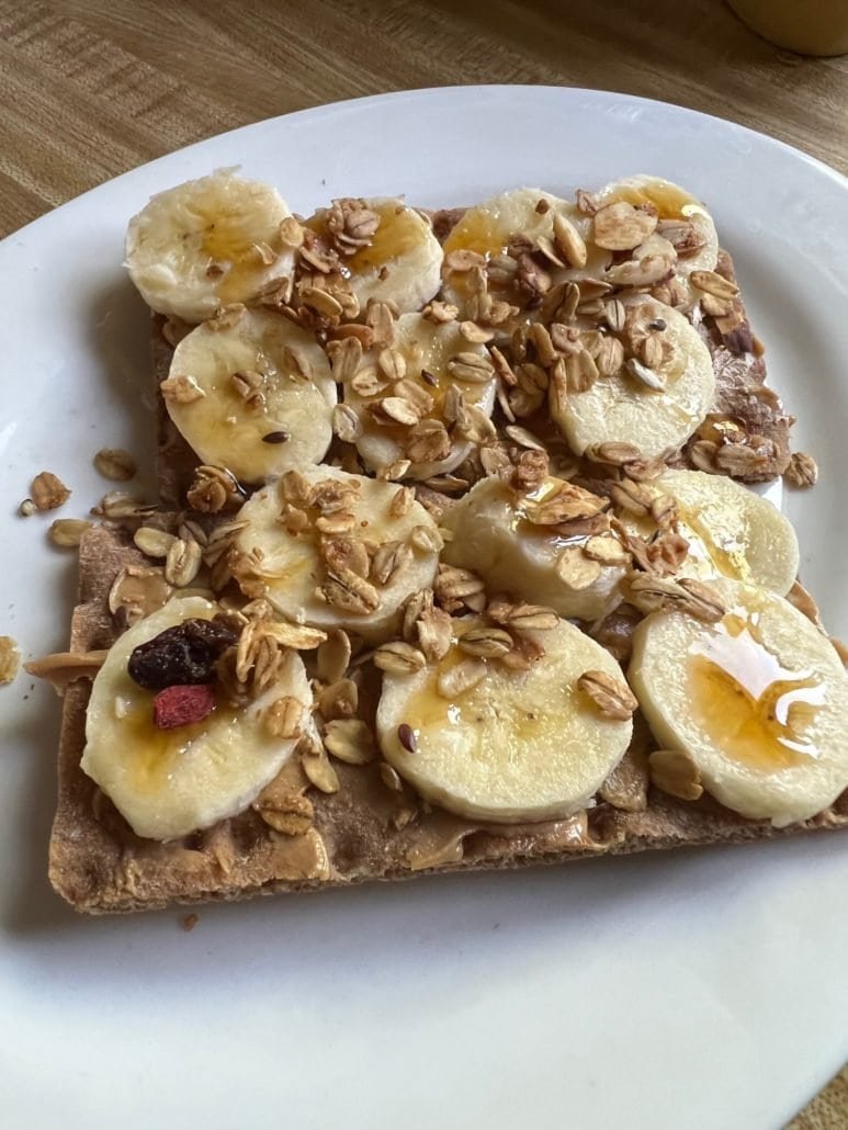 this is a snack of wasa crackers with peanut butter and banana