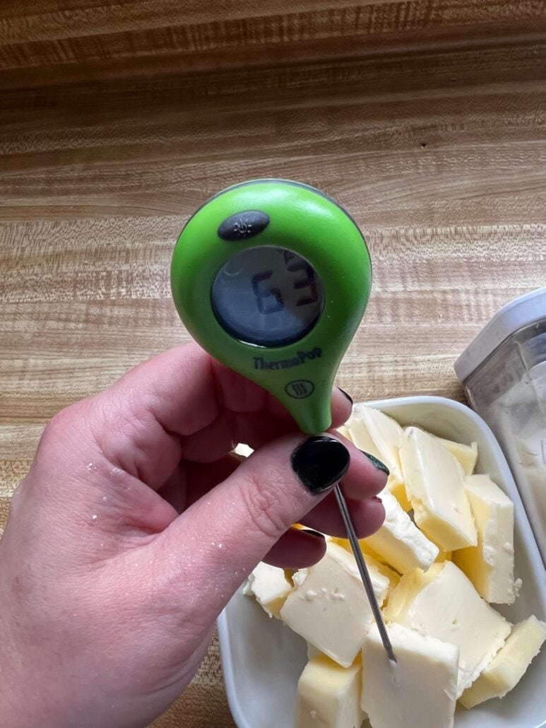 testing the temperature of butter