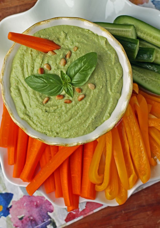 this is basil hummus with cut vegetables