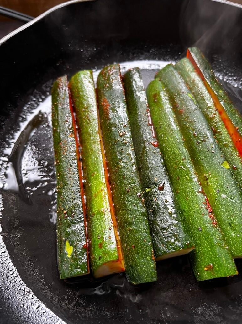 these are seasoning zucchini being sauteed for tacos
