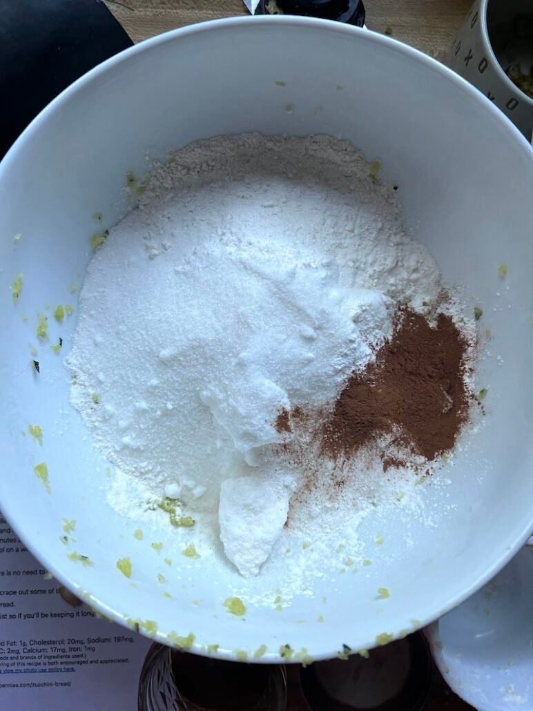 this is a bowl of dry ingredients needed for zucchini bread