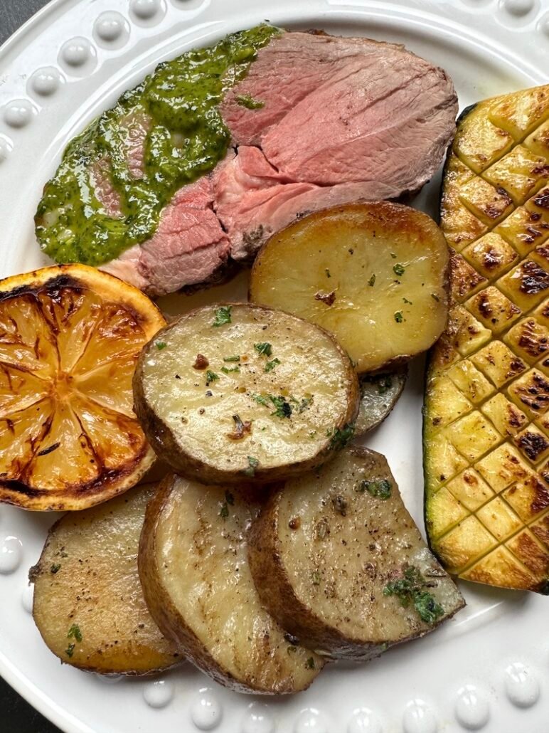 this is a plate of lamb with idaho potatoes