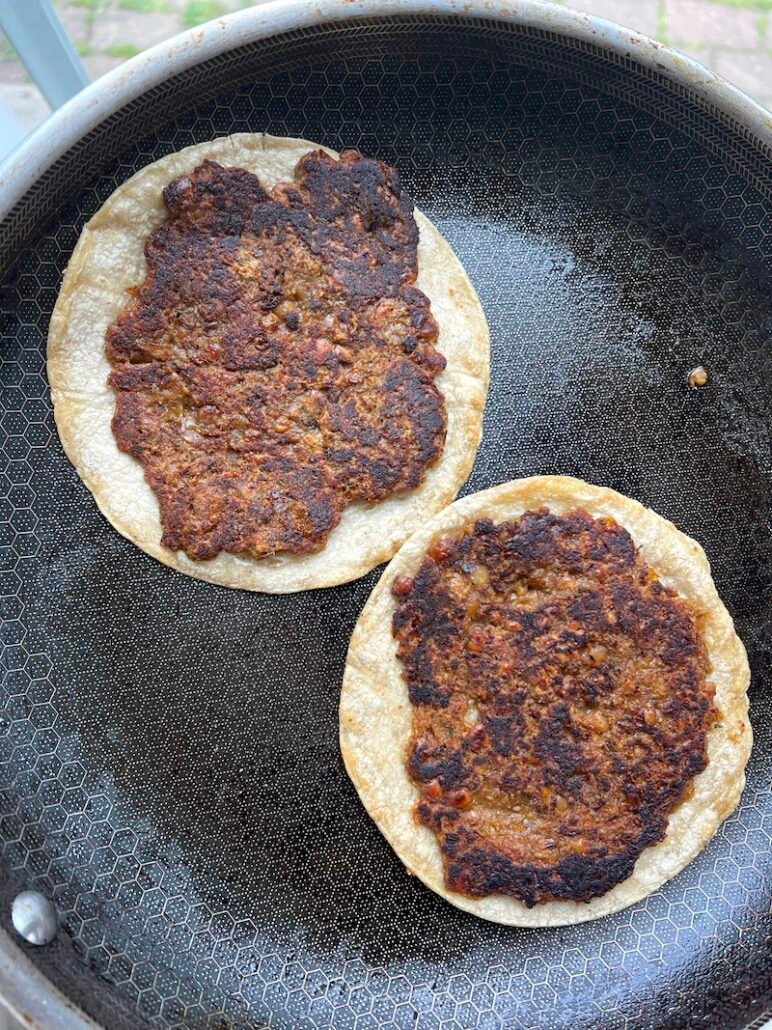 these are lentil smash burger tacos in a pan