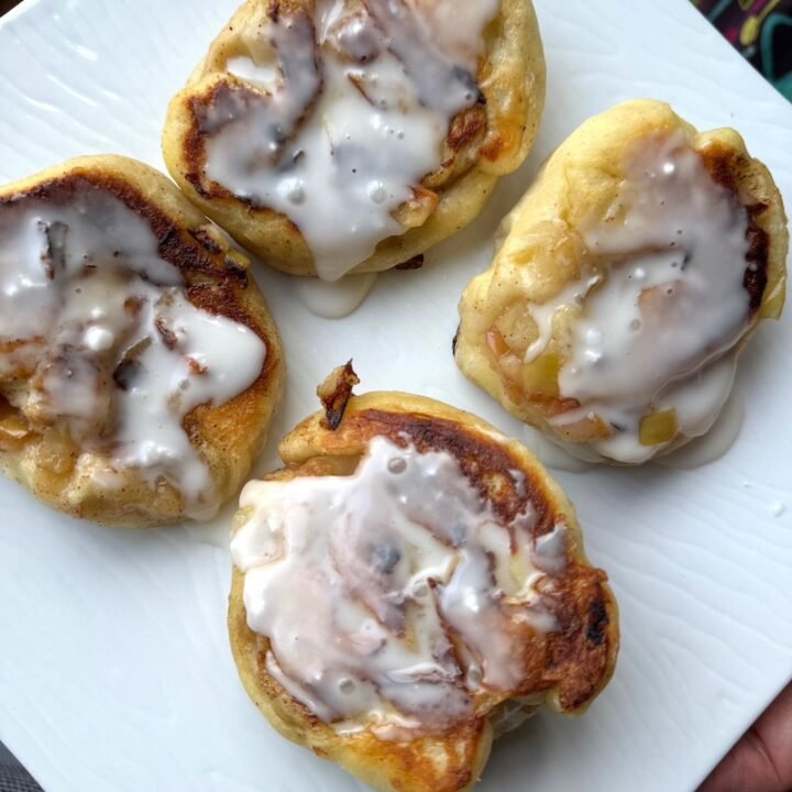 this is a plate of apple fritters made with skinny pizza dough