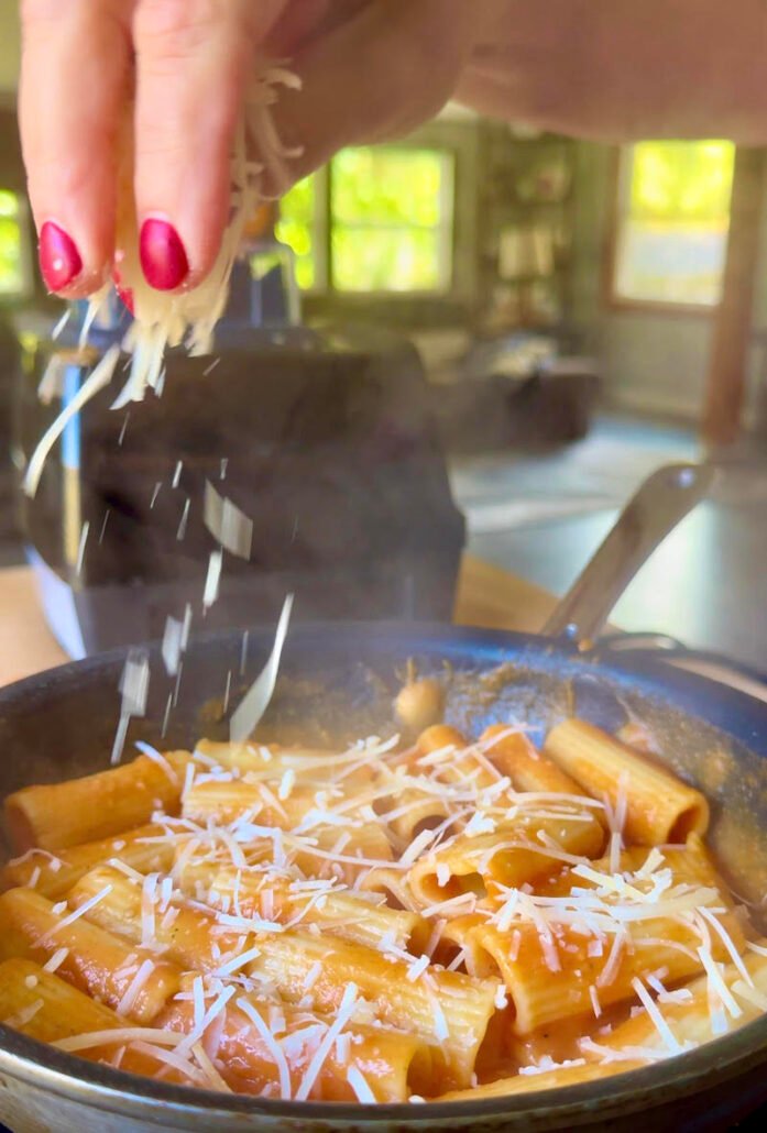 parmesan cheese being sprinkled