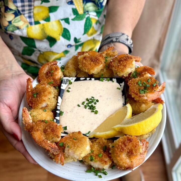 this is a plate of crispy pan fried panko shrimp