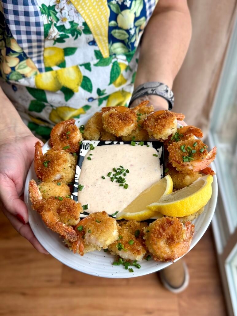 this is a plate of crispy pan fried panko shrimp