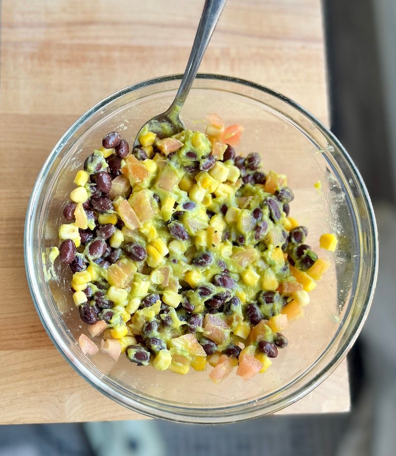 this is a guacamole mix of black beans and corn