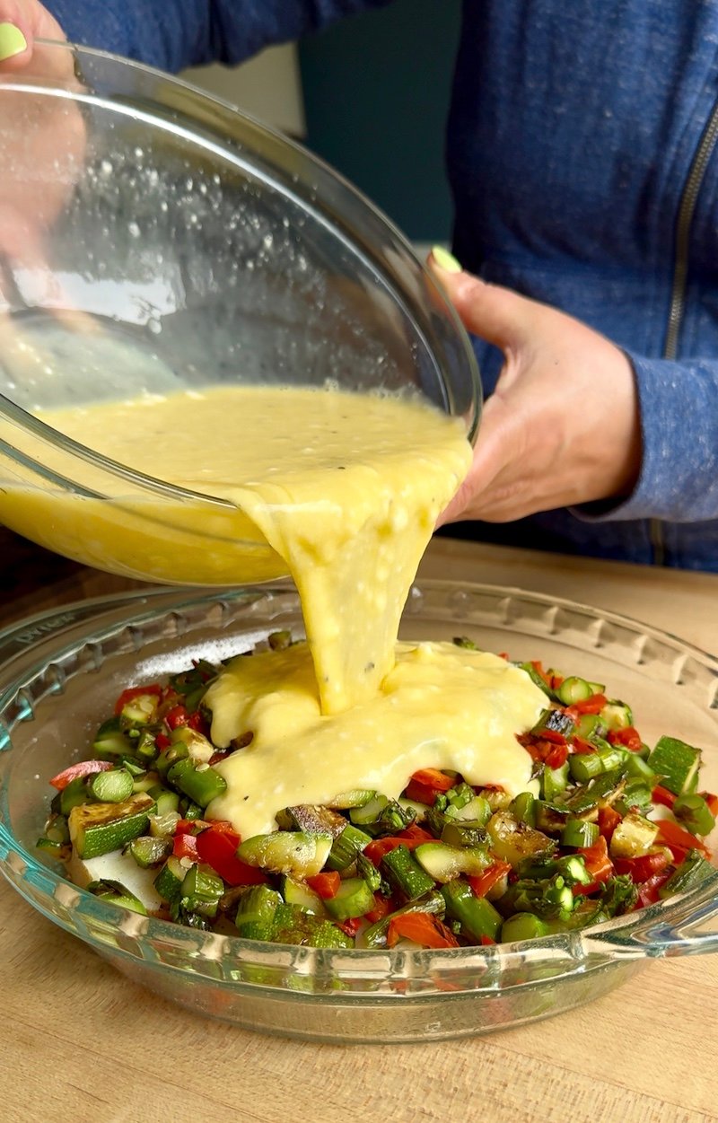 egg mixture over farmers market quiche