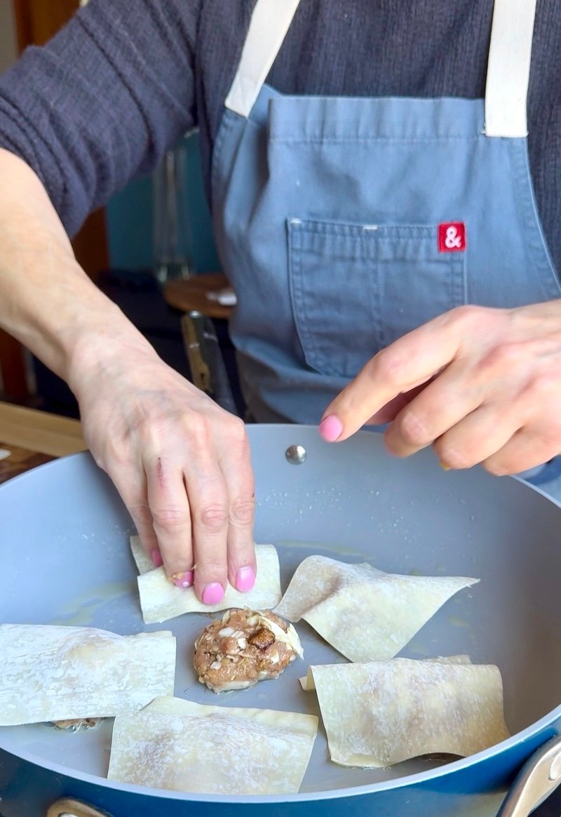 topping lazy pork wontons with wonton skin