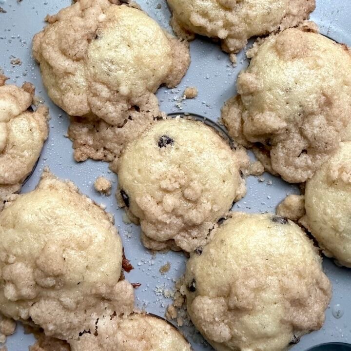 mini banana chocolate chip muffins in a muffin tin
